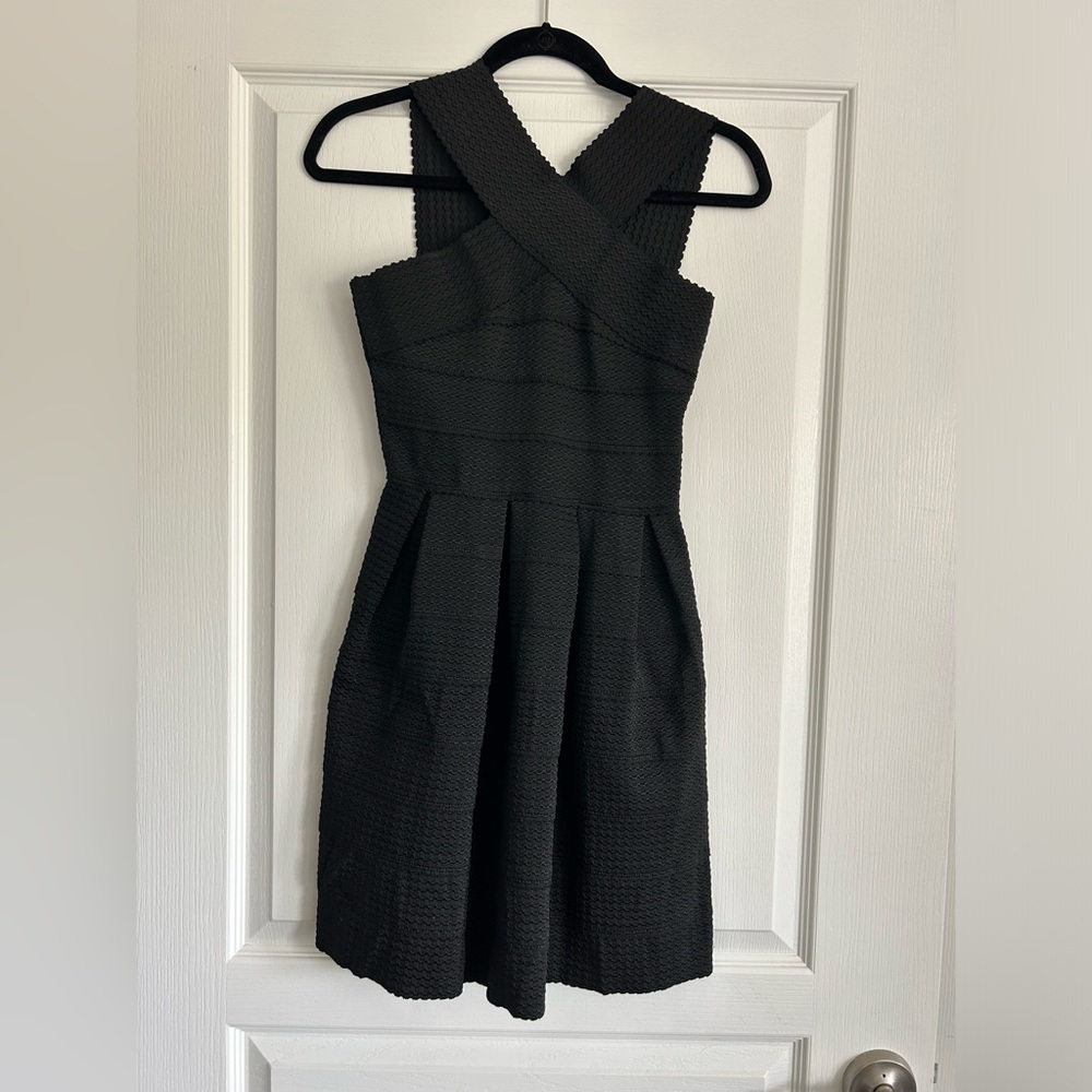 Black nylon bandage/fit and flare V-neck, sleeveless dress